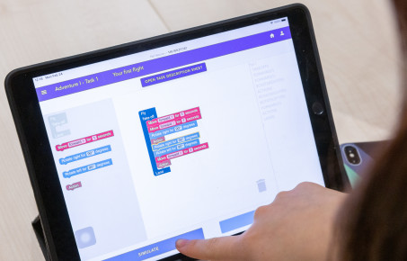 person using a tablet computer