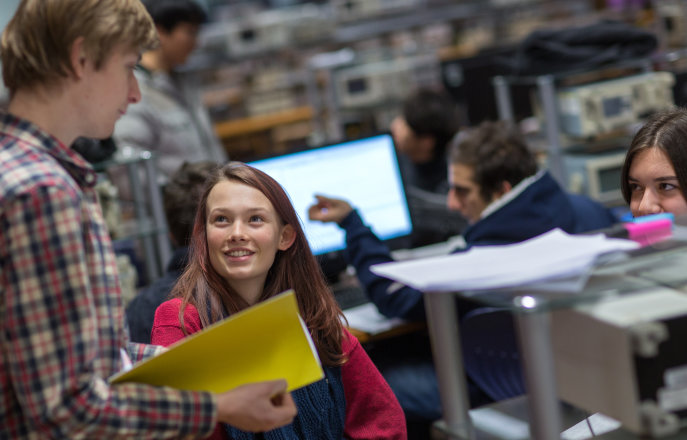 Students talking in the first year lab