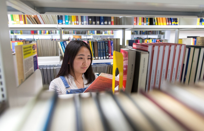 student choosing a book