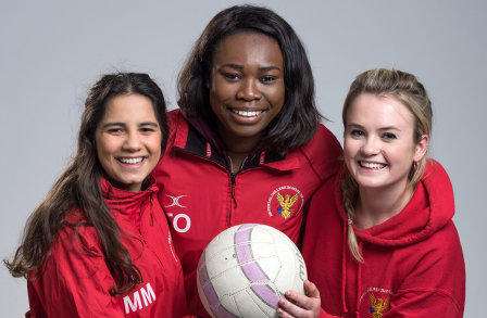 Photo of Temi Olonisakin and two other netball players