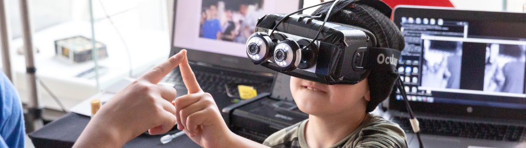 Child wearing VR headset