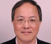 Portrait photo of Professor Kin Leung smiling.