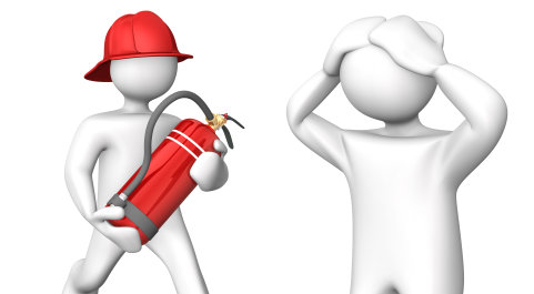 One figure holding extinguisher, another panicking