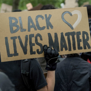 Sign at protest reads Black Lives Matter
