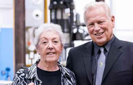Two donors look at the camera, smiling