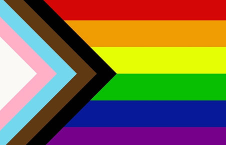 Inclusive rainbow pride flag including colours of the trans flag and brown and black stripes to represent people of colour