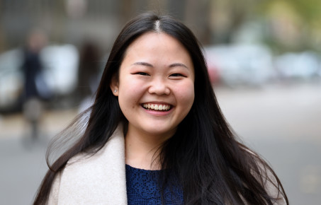 Student smiles at the camera