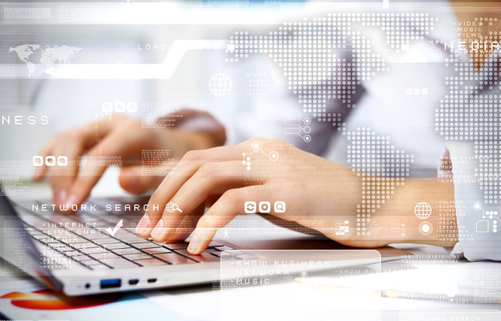 person typing on laptop