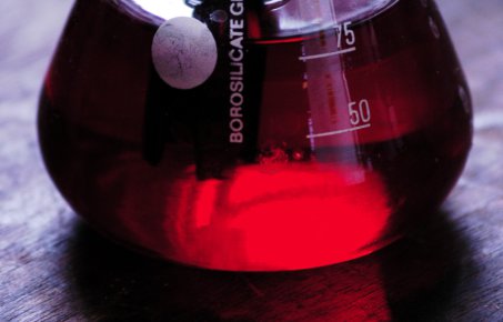 Glass of red liquid