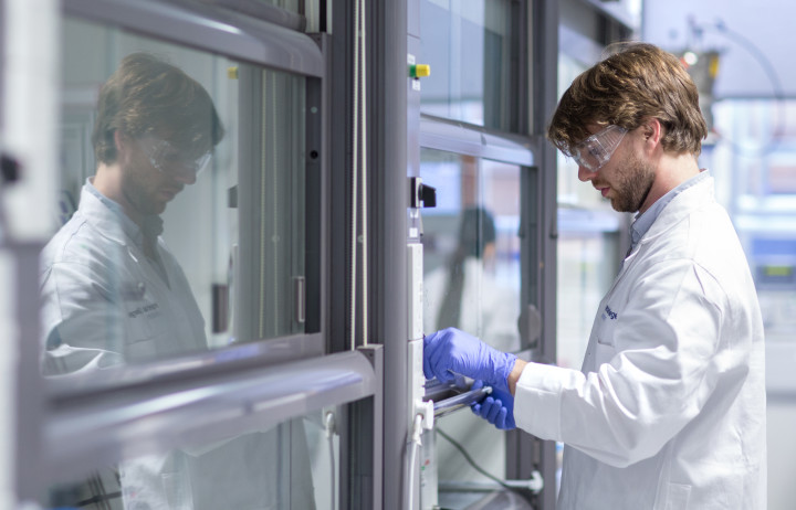 A student preparing a fume cupboard