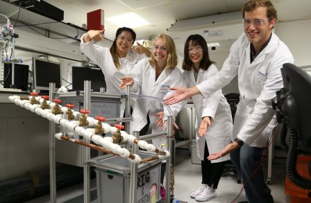 Summer school students pose with their completed rig