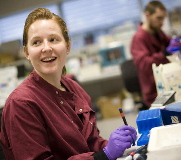 PhD students working in lab