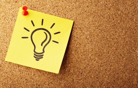 lightbulb on post it note