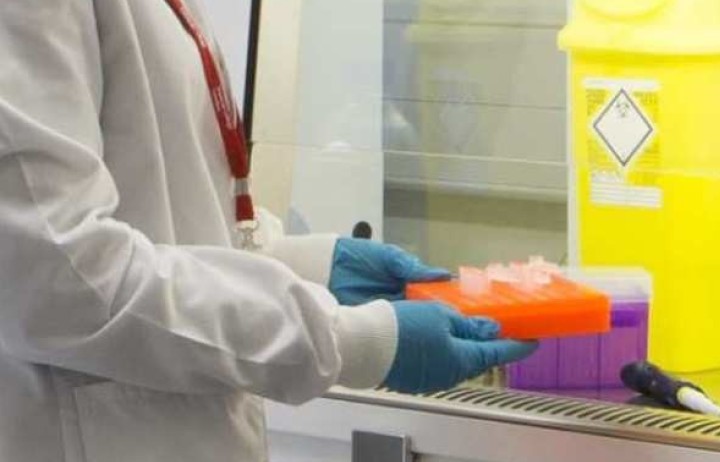 Woman in lab coat