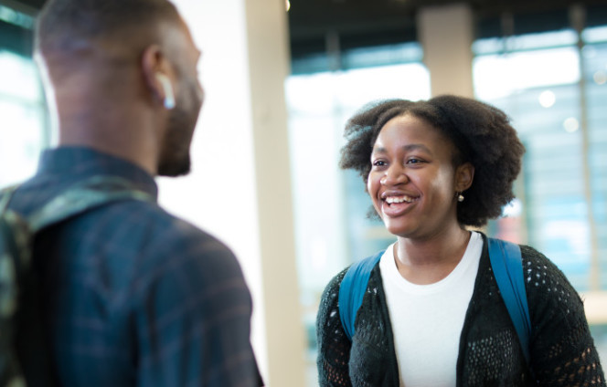 Two students talking to each other