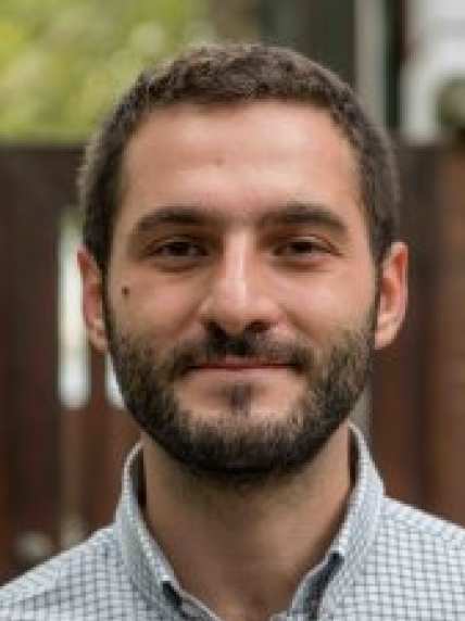 Headshot of Dr Oytan Babacan